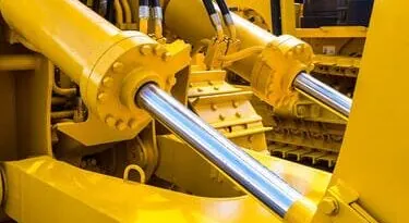 Verins hydrauliques sur engin de TP
